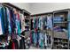 Spacious walk-in closet with ample shelving and hanging space at 4318 St Stephen St, The Villages, FL 32163