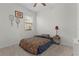 Charming bedroom with a queen bed and neutral decor at 5300 Sunshine Dr, Wildwood, FL 34785