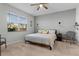 Spacious bedroom with king-size bed and ample natural light at 5300 Sunshine Dr, Wildwood, FL 34785