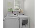 Convenient laundry room with washer and dryer included at 5300 Sunshine Dr, Wildwood, FL 34785
