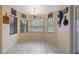 Cozy breakfast nook with large windows and tile flooring at 5318 Greens Dr, Lady Lake, FL 32159