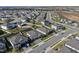 Aerial view showcasing a well-planned community with houses and roads at 771 Annabell Ridge Rd, Minneola, FL 34715