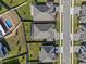 Aerial view of a house with a large backyard and screened enclosure at 771 Annabell Ridge Rd, Minneola, FL 34715