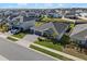 Aerial view of a house with a three-car garage and nicely landscaped yard at 771 Annabell Ridge Rd, Minneola, FL 34715