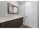 Clean bathroom with a single vanity and updated cabinetry at 771 Annabell Ridge Rd, Minneola, FL 34715