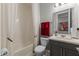 Bathroom with a bathtub, toilet and single vanity at 771 Annabell Ridge Rd, Minneola, FL 34715