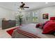 Bright and airy bedroom with a comfortable bed and plenty of natural light at 771 Annabell Ridge Rd, Minneola, FL 34715