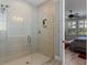 Spacious shower with glass enclosure and modern tile at 771 Annabell Ridge Rd, Minneola, FL 34715