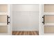 Walk-in closet with wire shelving and barn doors at 811 Saint Andrews Blvd, The Villages, FL 32159