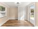 Sunlit dining room with built-in shelving and exterior access at 811 Saint Andrews Blvd, The Villages, FL 32159