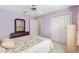Bedroom with double bed and built-in closet at 9199 Se 171St Cooper Loop, The Villages, FL 32162