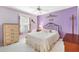Bright bedroom with double bed and dresser at 9199 Se 171St Cooper Loop, The Villages, FL 32162