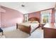 Large bedroom with high ceilings and a ceiling fan at 9199 Se 171St Cooper Loop, The Villages, FL 32162