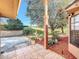 Spacious backyard patio with ample space for outdoor furniture and a view of the surrounding landscape at 9835 Lakeshore Dr, Clermont, FL 34711