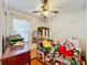 Small bedroom with hardwood floors and ample storage space at 9835 Lakeshore Dr, Clermont, FL 34711