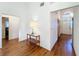 Light and airy entryway with wood flooring at 9835 Lakeshore Dr, Clermont, FL 34711