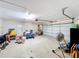 Two-car garage with ample storage space at 9835 Lakeshore Dr, Clermont, FL 34711