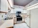 Kitchen with stainless steel appliances at 9835 Lakeshore Dr, Clermont, FL 34711