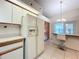 Kitchen with refrigerator and breakfast bar at 9835 Lakeshore Dr, Clermont, FL 34711