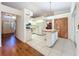 Kitchen with island and stainless steel appliances at 9835 Lakeshore Dr, Clermont, FL 34711