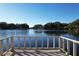 Serene lake view from a private dock at 9835 Lakeshore Dr, Clermont, FL 34711