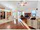 Spacious living room features hardwood floors and a fireplace at 9835 Lakeshore Dr, Clermont, FL 34711