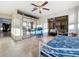 Sunroom with mirrored closet and relaxing daybed at 9835 Lakeshore Dr, Clermont, FL 34711