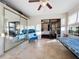 Spacious sunroom with mirrored closet and seating at 9835 Lakeshore Dr, Clermont, FL 34711