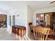 Sunroom with tiled floors, access to patio and lake view at 9835 Lakeshore Dr, Clermont, FL 34711