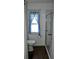 Clean bathroom with shower/tub combo and blue curtains at 101 Mango Cv, Leesburg, FL 34748