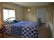 Spacious bedroom with large bed and ample closet space at 101 Mango Cv, Leesburg, FL 34748