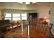 Large TV and comfortable seating at 101 Mango Cv, Leesburg, FL 34748
