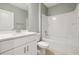 Well-appointed bathroom with a tub shower combo and white vanity at 1115 Calico Pointe Cir, Groveland, FL 34736