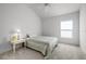 Bright bedroom with carpeted floor and window at 11415 Roma Rd, Oxford, FL 34484