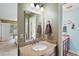 Clean bathroom with granite countertop, single sink, and ample storage at 1281 Gray Ct, Eustis, FL 32726