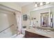 Bathroom with tub, shower, granite countertop and vanity at 1281 Gray Ct, Eustis, FL 32726