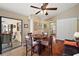 Game room with a round table, chairs and access to patio at 1281 Gray Ct, Eustis, FL 32726