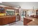 Updated kitchen with granite countertops, stainless steel appliances, and wood cabinets at 1281 Gray Ct, Eustis, FL 32726