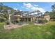 Inviting pool area with screened enclosure at 1281 Gray Ct, Eustis, FL 32726