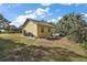 Detached workshop in backyard with gravel area at 1281 Gray Ct, Eustis, FL 32726