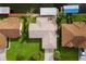 Top-down view of the house and surrounding properties at 13340 Country Club Dr, Tavares, FL 32778