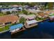 Property showcasing canal front access and boat storage at 13340 Country Club Dr, Tavares, FL 32778