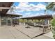 Relaxing backyard with wooden deck, screened porch, and waterfront access at 13340 Country Club Dr, Tavares, FL 32778