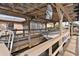Covered boat dock with wooden decking and canal views at 13340 Country Club Dr, Tavares, FL 32778