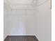 Large closet with double hanging rods and wire shelving at 13340 Country Club Dr, Tavares, FL 32778