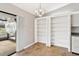 White built-in pantry with ample shelving for storage at 13340 Country Club Dr, Tavares, FL 32778