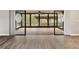 Covered patio overlooking the water at 13340 Country Club Dr, Tavares, FL 32778