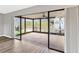 Screened-in patio with water views at 13340 Country Club Dr, Tavares, FL 32778