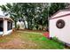 Pathway leads to shed in the backyard at 202 Forest Park Ln, Lady Lake, FL 32159