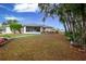 Backyard with patio and landscaping at 202 Forest Park Ln, Lady Lake, FL 32159